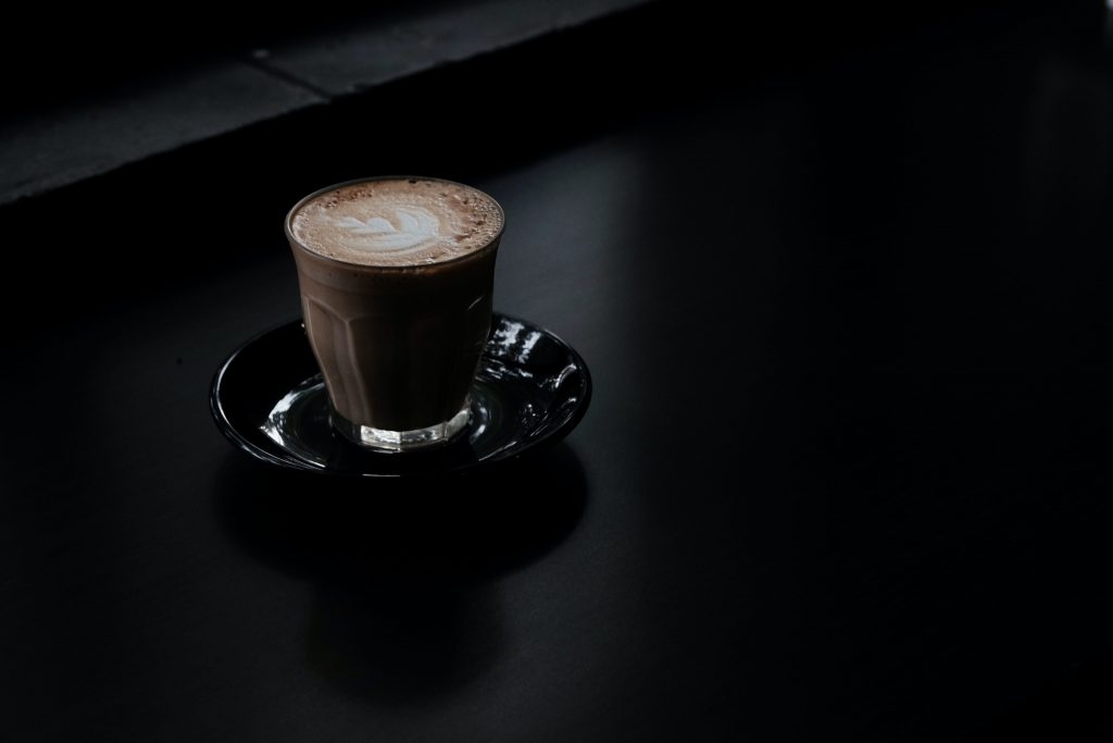 Dark latte on a black table